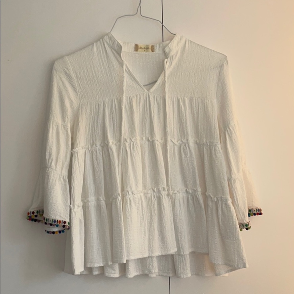 altard state white blouse with pom pom sleeves